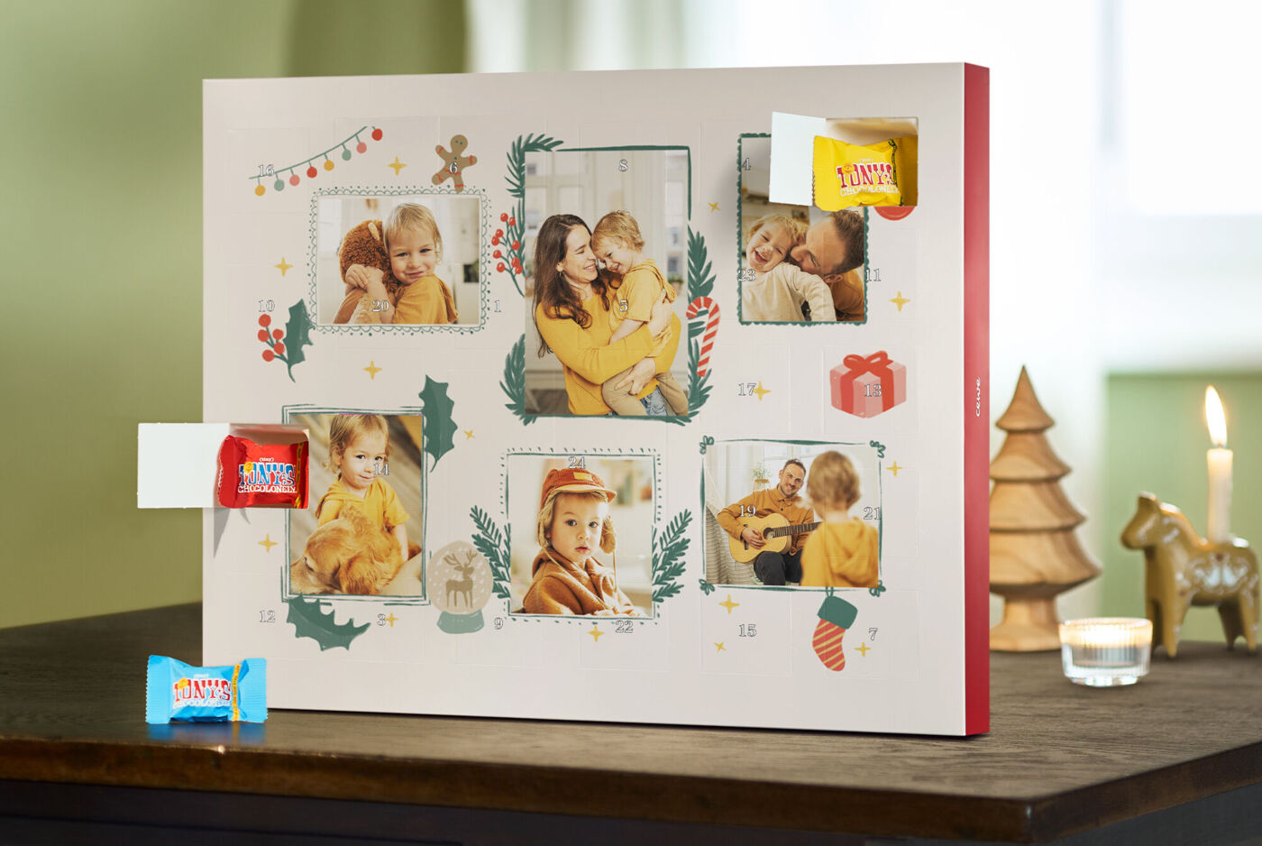 Adventski kalendar sa sretnim obiteljskim fotografijama i slasticama, pažljivo osmišljen za vrijeme adventa.